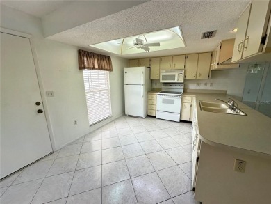 Enjoy the ease of maintenance-free living in this charming and on Beacon Woods Golf Club in Florida - for sale on GolfHomes.com, golf home, golf lot