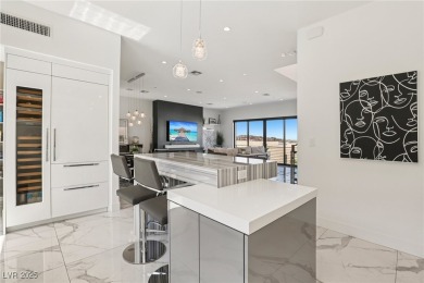 Experience sweeping Strip and mountain views from this elegant on Dragon Ridge Country Club in Nevada - for sale on GolfHomes.com, golf home, golf lot