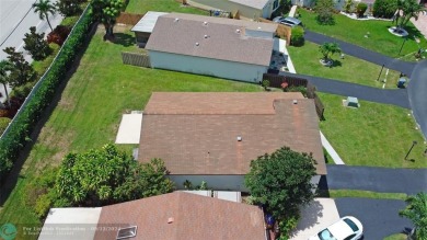 Spacious Gated two bedrooms, two bath single family home with a on Cypress Creek Country Club - Boynton Beach in Florida - for sale on GolfHomes.com, golf home, golf lot