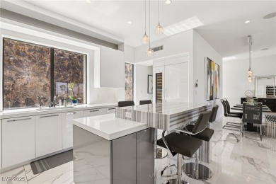 Experience sweeping Strip and mountain views from this elegant on Dragon Ridge Country Club in Nevada - for sale on GolfHomes.com, golf home, golf lot