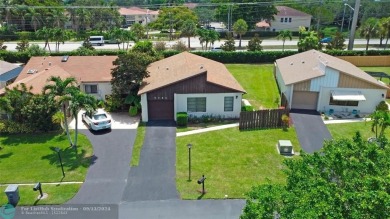 Spacious Gated two bedrooms, two bath single family home with a on Cypress Creek Country Club - Boynton Beach in Florida - for sale on GolfHomes.com, golf home, golf lot