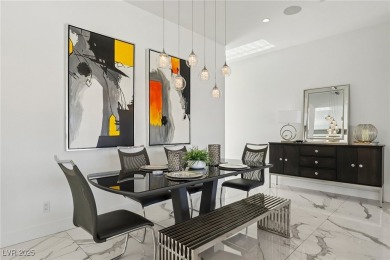 Experience sweeping Strip and mountain views from this elegant on Dragon Ridge Country Club in Nevada - for sale on GolfHomes.com, golf home, golf lot