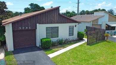 Spacious Gated two bedrooms, two bath single family home with a on Cypress Creek Country Club - Boynton Beach in Florida - for sale on GolfHomes.com, golf home, golf lot