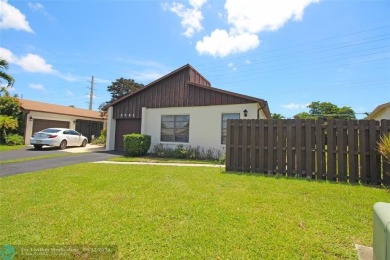 Spacious Gated two bedrooms, two bath single family home with a on Cypress Creek Country Club - Boynton Beach in Florida - for sale on GolfHomes.com, golf home, golf lot