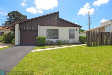 Spacious Gated two bedrooms, two bath single family home with a on Cypress Creek Country Club - Boynton Beach in Florida - for sale on GolfHomes.com, golf home, golf lot