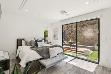 Experience sweeping Strip and mountain views from this elegant on Dragon Ridge Country Club in Nevada - for sale on GolfHomes.com, golf home, golf lot