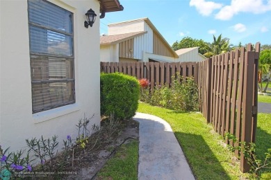 Spacious Gated two bedrooms, two bath single family home with a on Cypress Creek Country Club - Boynton Beach in Florida - for sale on GolfHomes.com, golf home, golf lot