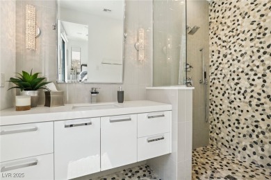 Experience sweeping Strip and mountain views from this elegant on Dragon Ridge Country Club in Nevada - for sale on GolfHomes.com, golf home, golf lot