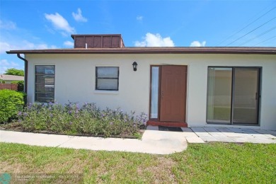 Spacious Gated two bedrooms, two bath single family home with a on Cypress Creek Country Club - Boynton Beach in Florida - for sale on GolfHomes.com, golf home, golf lot