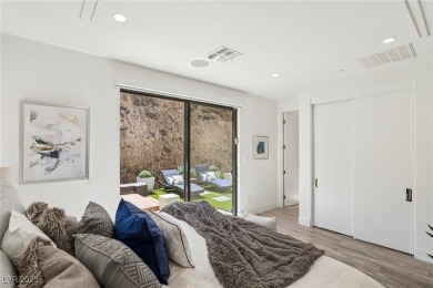 Experience sweeping Strip and mountain views from this elegant on Dragon Ridge Country Club in Nevada - for sale on GolfHomes.com, golf home, golf lot