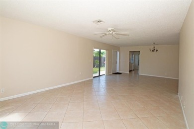 Spacious Gated two bedrooms, two bath single family home with a on Cypress Creek Country Club - Boynton Beach in Florida - for sale on GolfHomes.com, golf home, golf lot