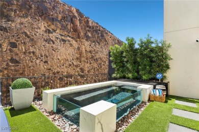 Experience sweeping Strip and mountain views from this elegant on Dragon Ridge Country Club in Nevada - for sale on GolfHomes.com, golf home, golf lot