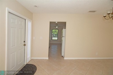 Spacious Gated two bedrooms, two bath single family home with a on Cypress Creek Country Club - Boynton Beach in Florida - for sale on GolfHomes.com, golf home, golf lot