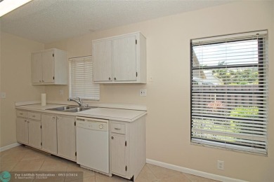 Spacious Gated two bedrooms, two bath single family home with a on Cypress Creek Country Club - Boynton Beach in Florida - for sale on GolfHomes.com, golf home, golf lot