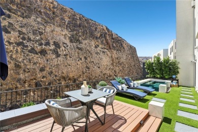 Experience sweeping Strip and mountain views from this elegant on Dragon Ridge Country Club in Nevada - for sale on GolfHomes.com, golf home, golf lot