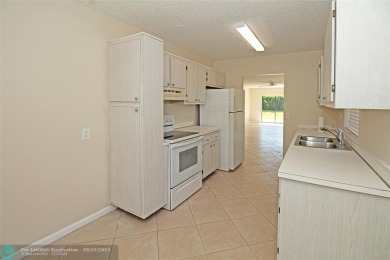 Spacious Gated two bedrooms, two bath single family home with a on Cypress Creek Country Club - Boynton Beach in Florida - for sale on GolfHomes.com, golf home, golf lot