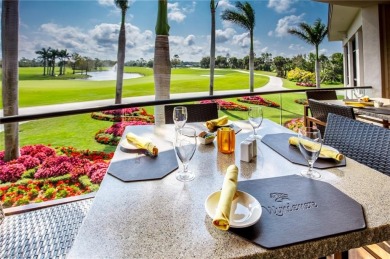 Elegant 1st floor corner condo with large lanai overlooking lake on Wyndemere Country Club in Florida - for sale on GolfHomes.com, golf home, golf lot