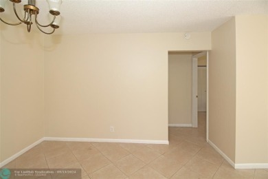 Spacious Gated two bedrooms, two bath single family home with a on Cypress Creek Country Club - Boynton Beach in Florida - for sale on GolfHomes.com, golf home, golf lot