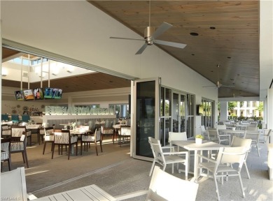 Elegant 1st floor corner condo with large lanai overlooking lake on Wyndemere Country Club in Florida - for sale on GolfHomes.com, golf home, golf lot