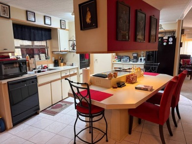 THIS LOVELY, MANUFACTURED HOME ON LEASED LAND.  PRICED TO SELL on Pine Lakes Country Club in Florida - for sale on GolfHomes.com, golf home, golf lot