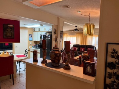 THIS LOVELY, MANUFACTURED HOME ON LEASED LAND.  PRICED TO SELL on Pine Lakes Country Club in Florida - for sale on GolfHomes.com, golf home, golf lot