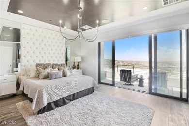 Experience sweeping Strip and mountain views from this elegant on Dragon Ridge Country Club in Nevada - for sale on GolfHomes.com, golf home, golf lot