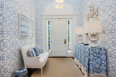 This extraordinary residence offers stunning lake and on Bentley Village Golf Course in Florida - for sale on GolfHomes.com, golf home, golf lot