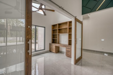 Presenting an exceptional transitional residence that embodies on Ram Rock Golf Course in Texas - for sale on GolfHomes.com, golf home, golf lot