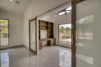 Presenting an exceptional transitional residence that embodies on Ram Rock Golf Course in Texas - for sale on GolfHomes.com, golf home, golf lot