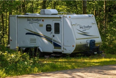Welcome to the kind of setting where life's stories accumulate on Hardwoods Golf Club At Mille Lacs in Minnesota - for sale on GolfHomes.com, golf home, golf lot