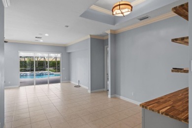 Located on one of the largest lots in The Lakes at PGA Village on PGA Golf Club in PGA Village in Florida - for sale on GolfHomes.com, golf home, golf lot