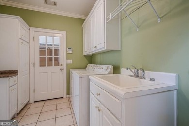 Located in the popular Medlock Bridge community-offering two on St. Ives Golf and Country Club in Georgia - for sale on GolfHomes.com, golf home, golf lot