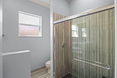 Located on one of the largest lots in The Lakes at PGA Village on PGA Golf Club in PGA Village in Florida - for sale on GolfHomes.com, golf home, golf lot