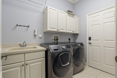 Located on one of the largest lots in The Lakes at PGA Village on PGA Golf Club in PGA Village in Florida - for sale on GolfHomes.com, golf home, golf lot