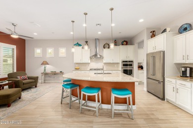 LIVING & LOVING THE ARIZONA DREAM!! This beautiful Endeavor on Poston Butte Golf Club in Arizona - for sale on GolfHomes.com, golf home, golf lot