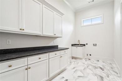 Presenting 13 Thunderbird, a stunning 1.5 year old masterpiece on Tchefuncta Country Club in Louisiana - for sale on GolfHomes.com, golf home, golf lot