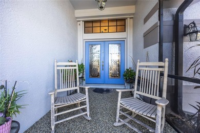 Welcome to this beautifully maintained waterfront home in on Palmetto-Pine Country Club in Florida - for sale on GolfHomes.com, golf home, golf lot