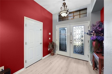 Welcome to this beautifully maintained waterfront home in on Palmetto-Pine Country Club in Florida - for sale on GolfHomes.com, golf home, golf lot