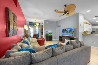 Welcome to this beautifully maintained waterfront home in on Palmetto-Pine Country Club in Florida - for sale on GolfHomes.com, golf home, golf lot