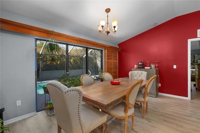 Welcome to this beautifully maintained waterfront home in on Palmetto-Pine Country Club in Florida - for sale on GolfHomes.com, golf home, golf lot