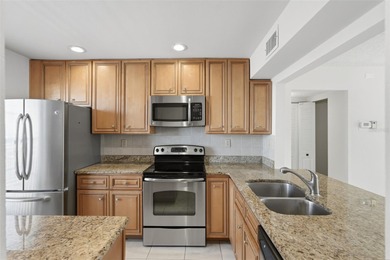 Welcome to your own piece of paradise! This beautifully updated on Isla Del Sol Yacht and Country Club in Florida - for sale on GolfHomes.com, golf home, golf lot