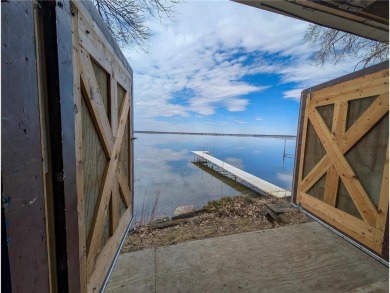 Nestled on the serene shores of Little Pine Lake, this on Perham Lakeside Country Club in Minnesota - for sale on GolfHomes.com, golf home, golf lot