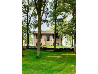 Nestled on the serene shores of Little Pine Lake, this on Perham Lakeside Country Club in Minnesota - for sale on GolfHomes.com, golf home, golf lot