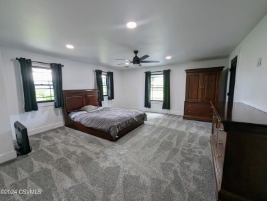 This 4528 sq ft home near Geisinger Medical Center in Danville on Liberty Valley Country Club in Pennsylvania - for sale on GolfHomes.com, golf home, golf lot