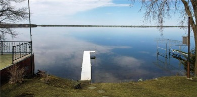 Nestled on the serene shores of Little Pine Lake, this on Perham Lakeside Country Club in Minnesota - for sale on GolfHomes.com, golf home, golf lot