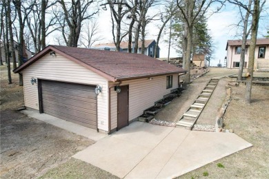 Nestled on the serene shores of Little Pine Lake, this on Perham Lakeside Country Club in Minnesota - for sale on GolfHomes.com, golf home, golf lot