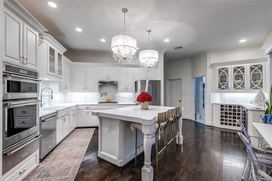 This is more than an upgraded home--it's a masterpiece of modern on The Trails of Frisco Golf Club in Texas - for sale on GolfHomes.com, golf home, golf lot