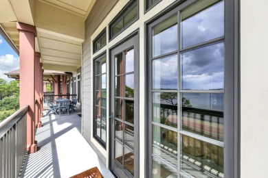 Welcome Home to your exquisite lakefront coastal oasis!  Wild on Sharks Tooth Golf Club in Florida - for sale on GolfHomes.com, golf home, golf lot