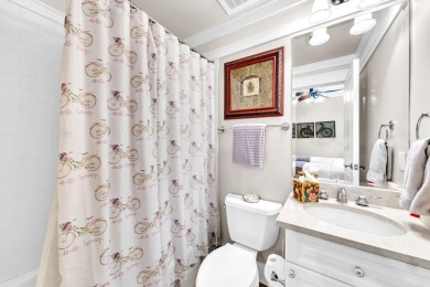 Welcome Home to your exquisite lakefront coastal oasis!  Wild on Sharks Tooth Golf Club in Florida - for sale on GolfHomes.com, golf home, golf lot