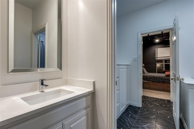 This is more than an upgraded home--it's a masterpiece of modern on The Trails of Frisco Golf Club in Texas - for sale on GolfHomes.com, golf home, golf lot